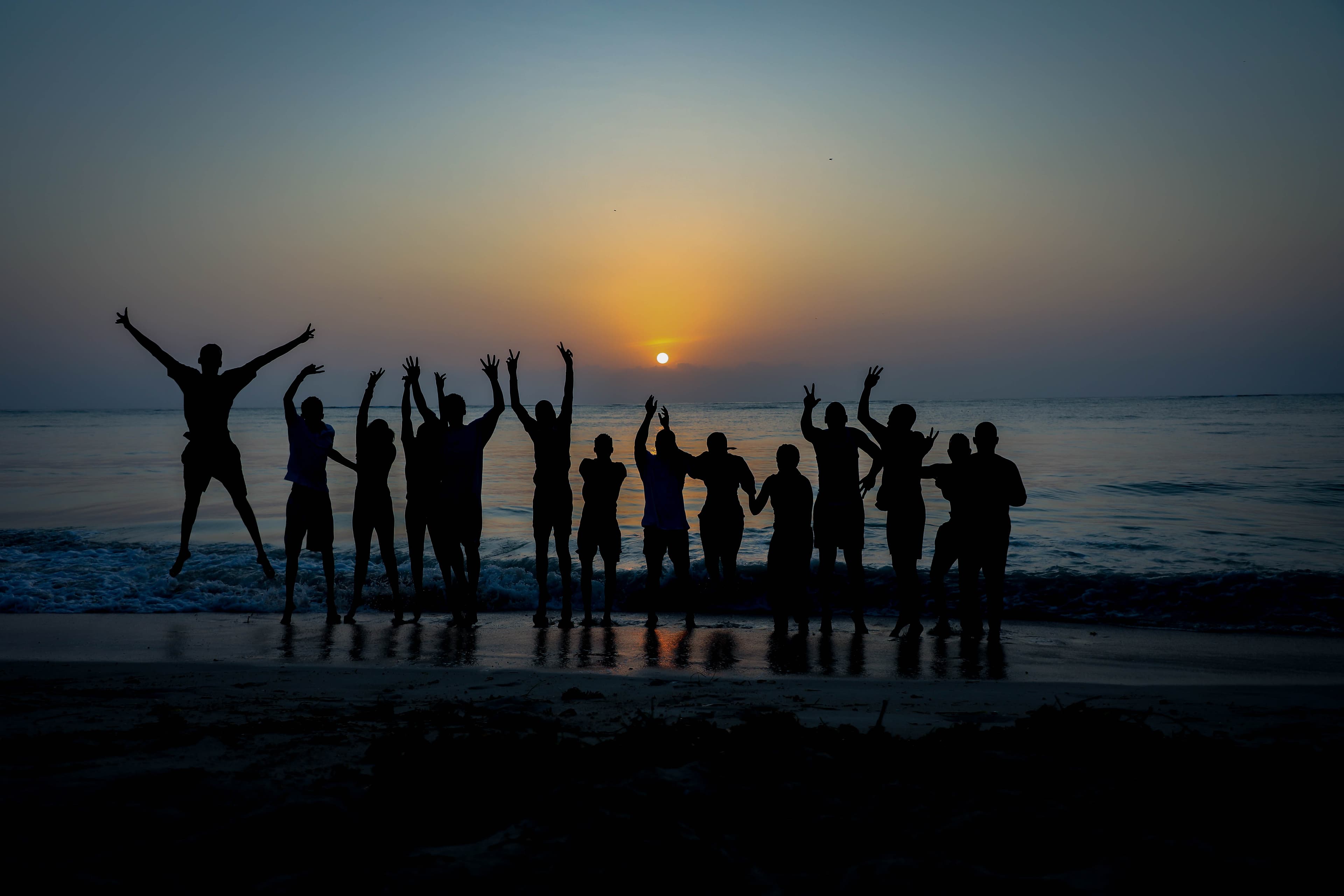Youth entrepreneurs having fun at the beach